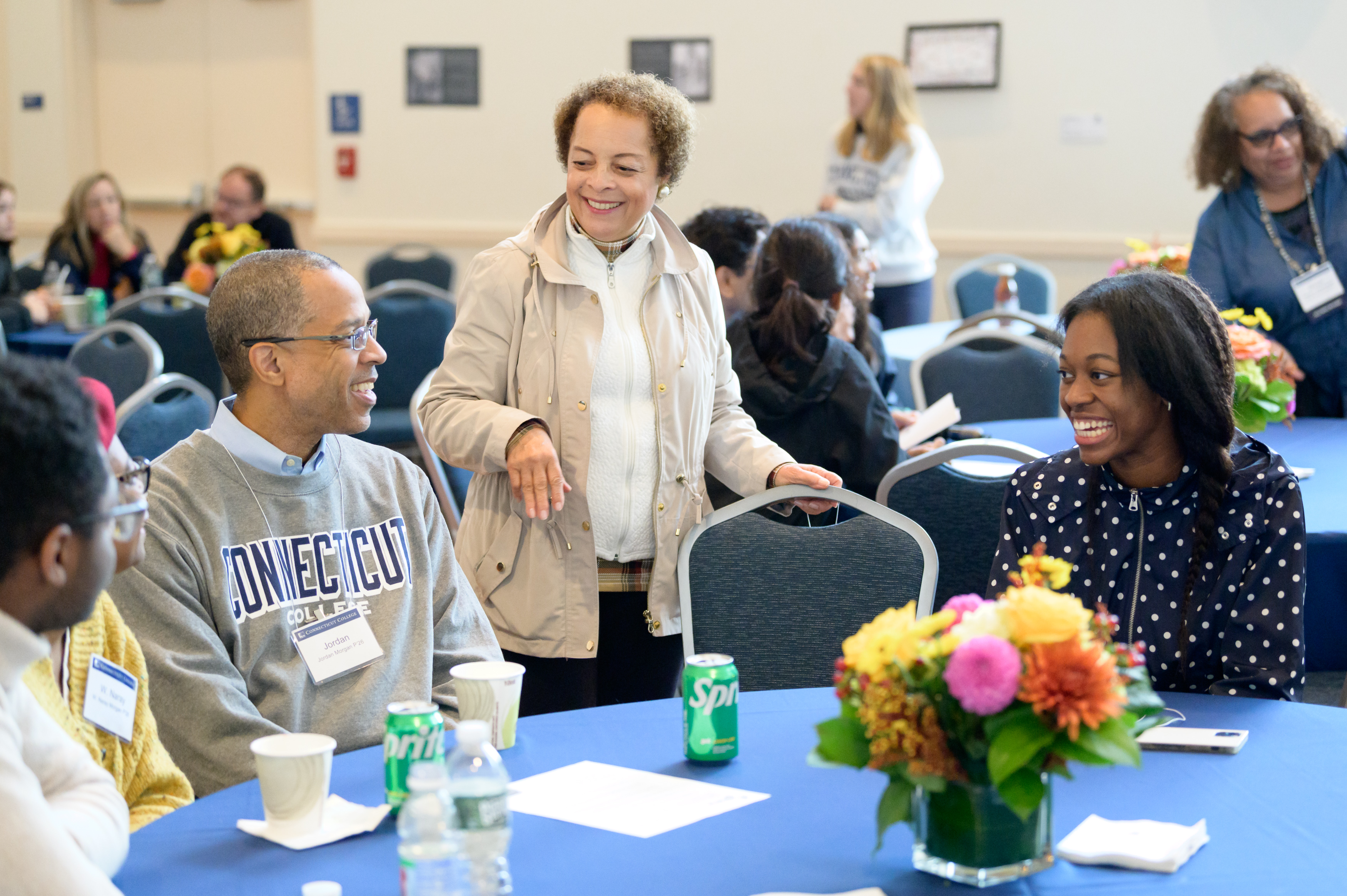 Parents and students visiting over refreshments