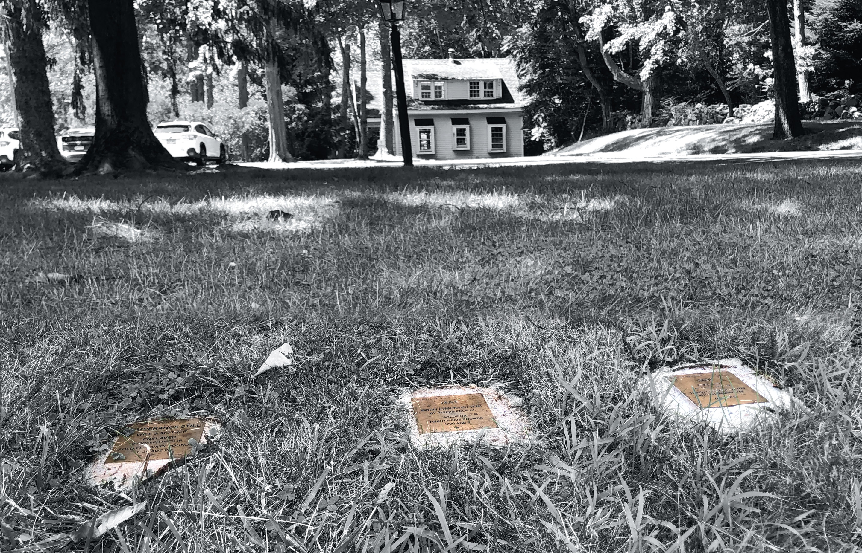 Witness stone markers in front of a house in Old Lyme, CT