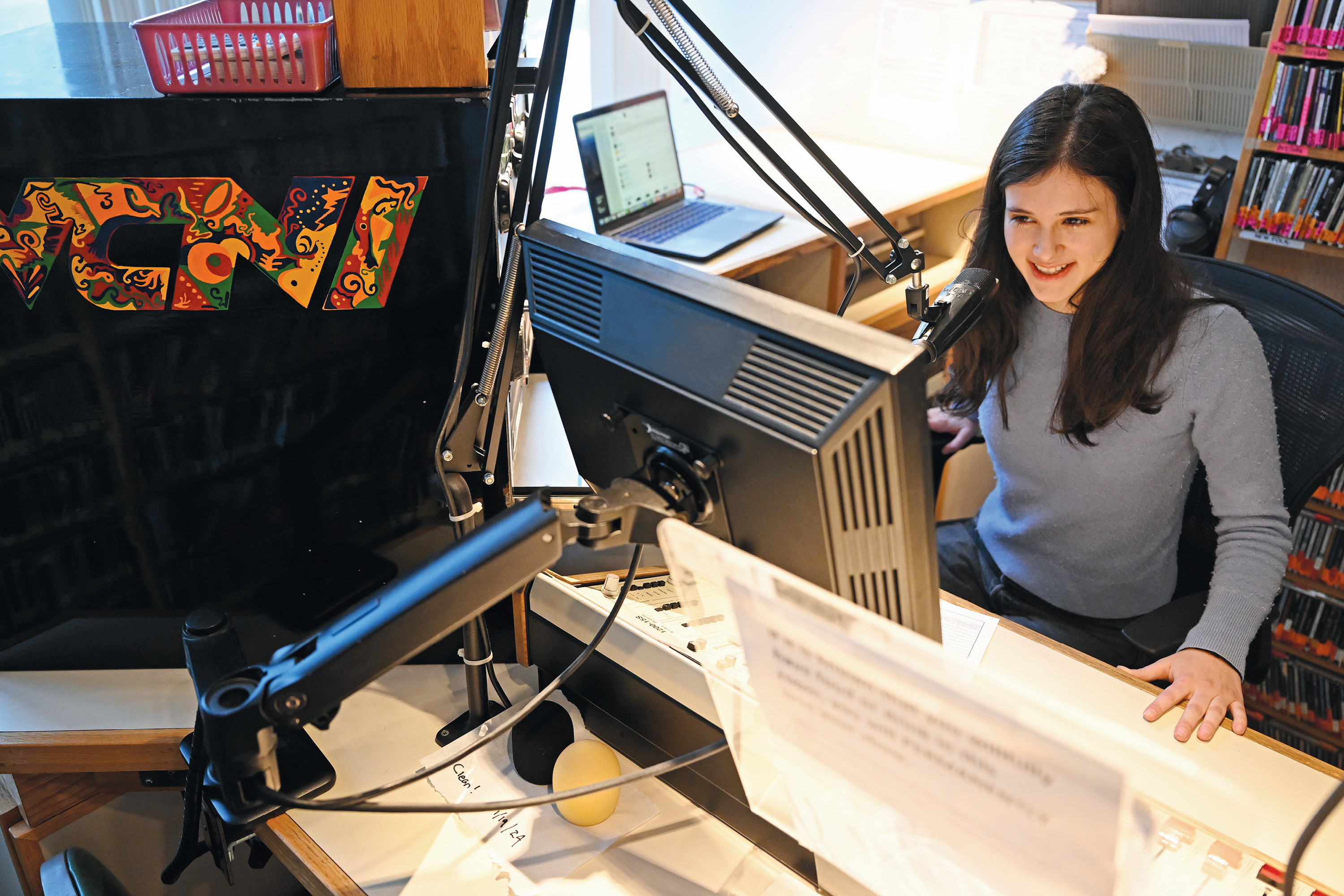 WCNI Student General Manager Riley Madden ‘26 helms the broadcast booth at the student radio station.