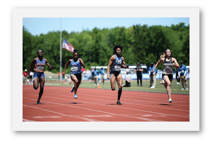 Student running track