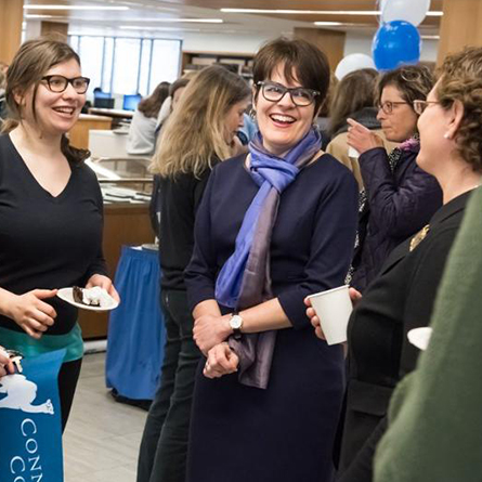 President Katherine Bergeron talks with students, faculty and staff. 