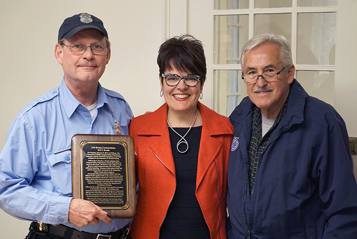 Campus Safety Officer Eric Roode poses with President Bergeron