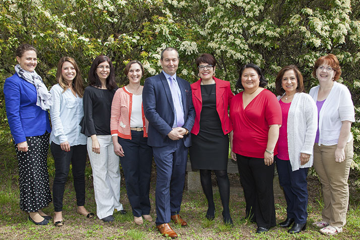 President Katherine Bergeron and Richard Madonna, VP for finance and administration with members of human resources, who were awarded the Team Citizenship Award.