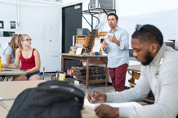 Author Jarrett Krosoczka speaks to students in Professor Timothy McDowell’s “Print Workshop” course