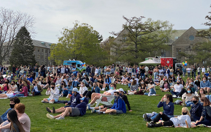 Students listen to the announcement of Conn's largest gift. 