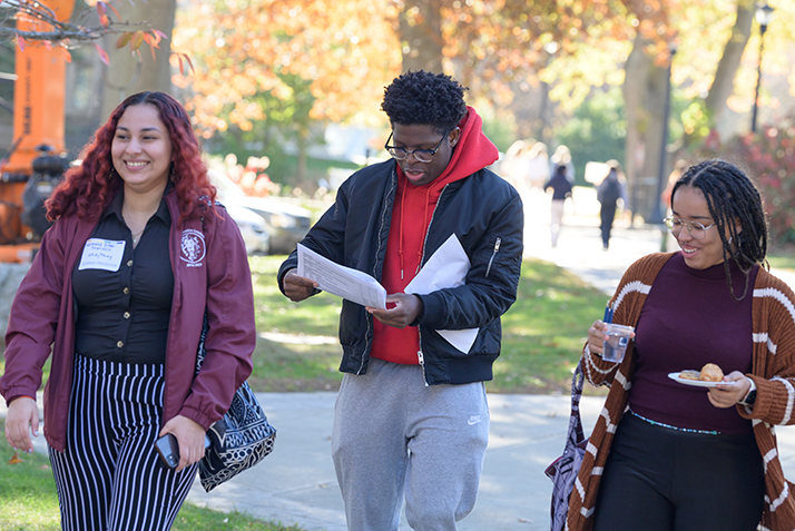 Students walk around campus during the All College Symposium