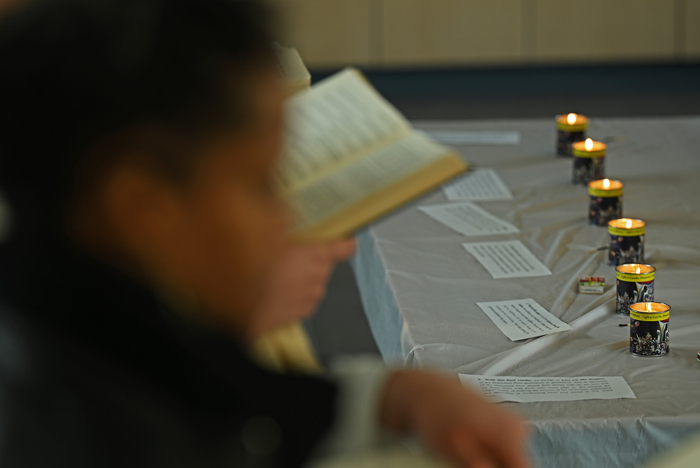 The lighting of six Yahrzeit candles at Zachs Hillel House representing the six-million jews slaughtered in the Holocaust as part of the Six Million Steps for Six Million Lives international effort led by the Israeli-American Council Tuesday, April 18, 2023.