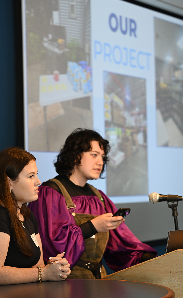 Summer Civic Leaders Alekandra Sinon ’26, left, and Apollo Suffi ’26 offer their final presentation at Cro’s Nest