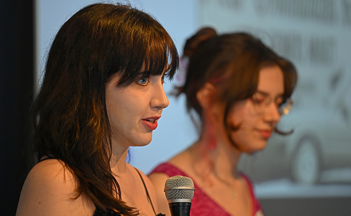 Summer Civic Leaders Melanie Rollins ’25, left, and Abby Dawson ’25 offer their final presentation.