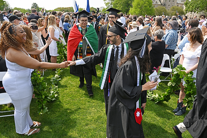 Graduates process through the Laurel Chain