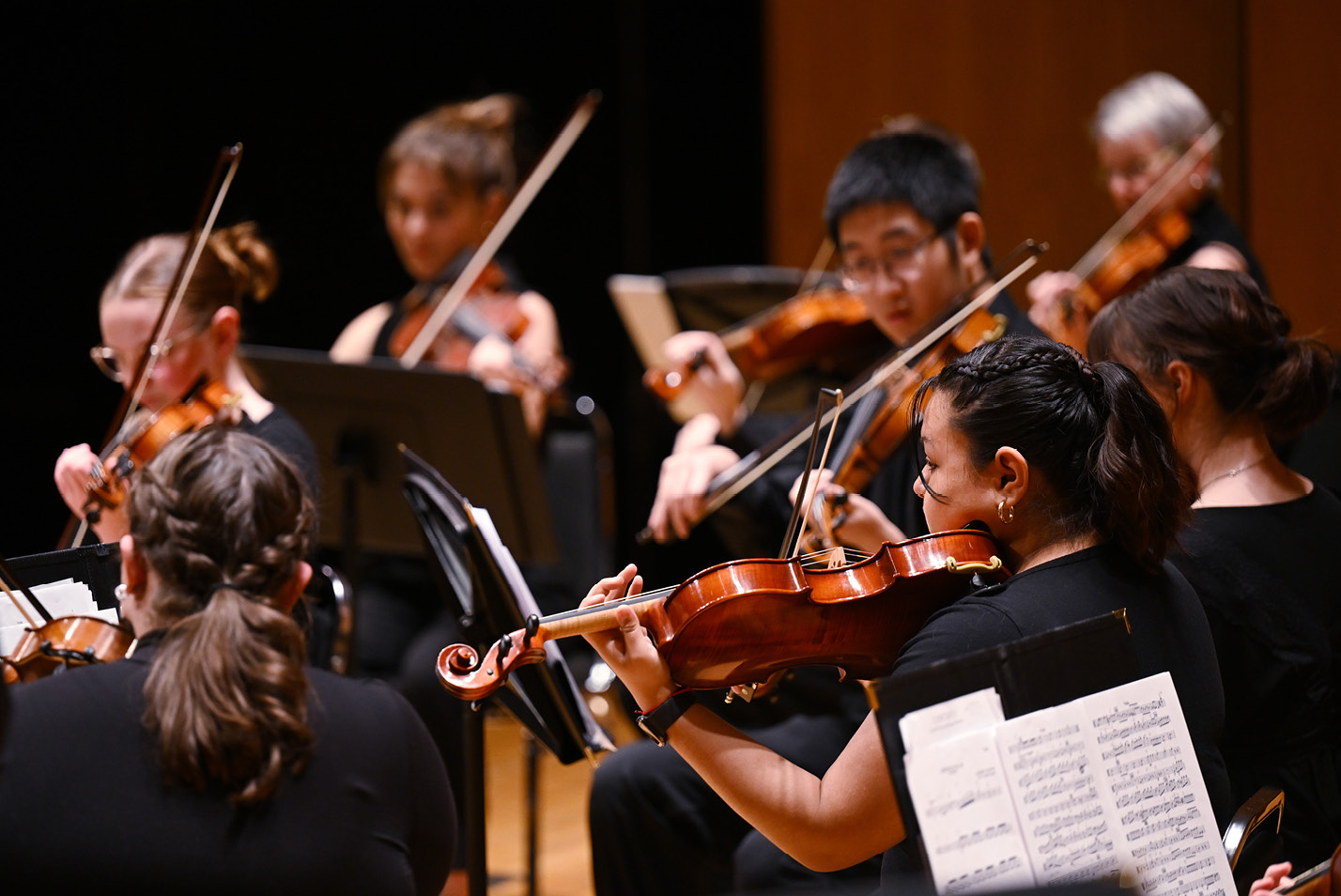 students playing violins in Evans Hall