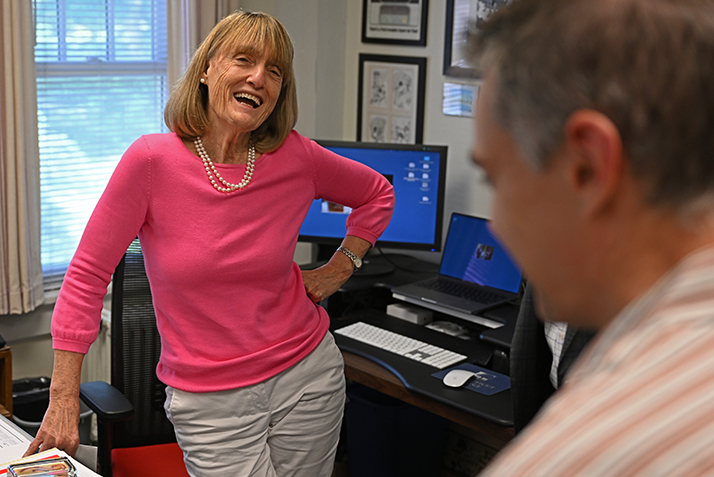 Nancy Lewandowski reacts to learning she's been selected for a staff award.