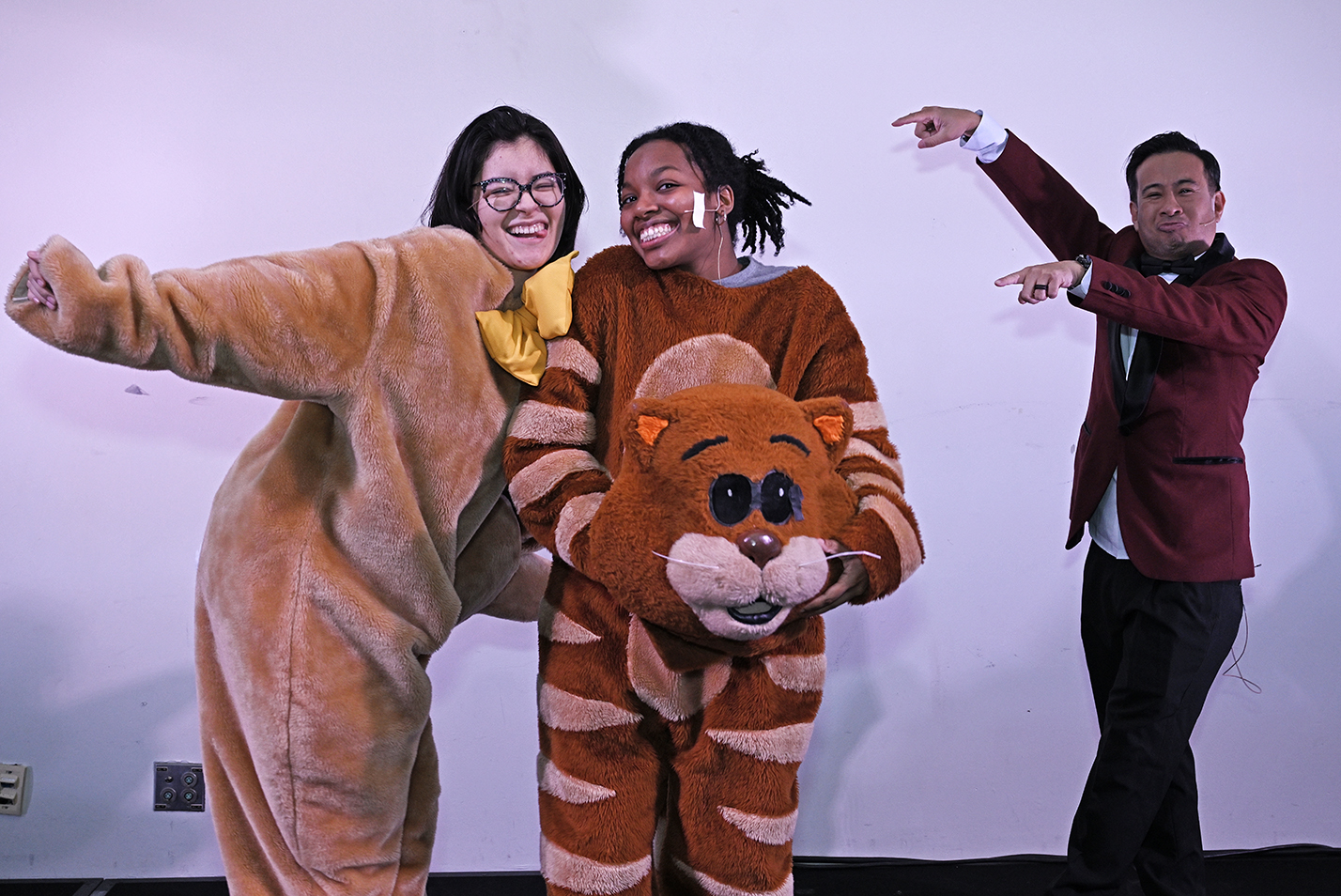 students in costumes smiling