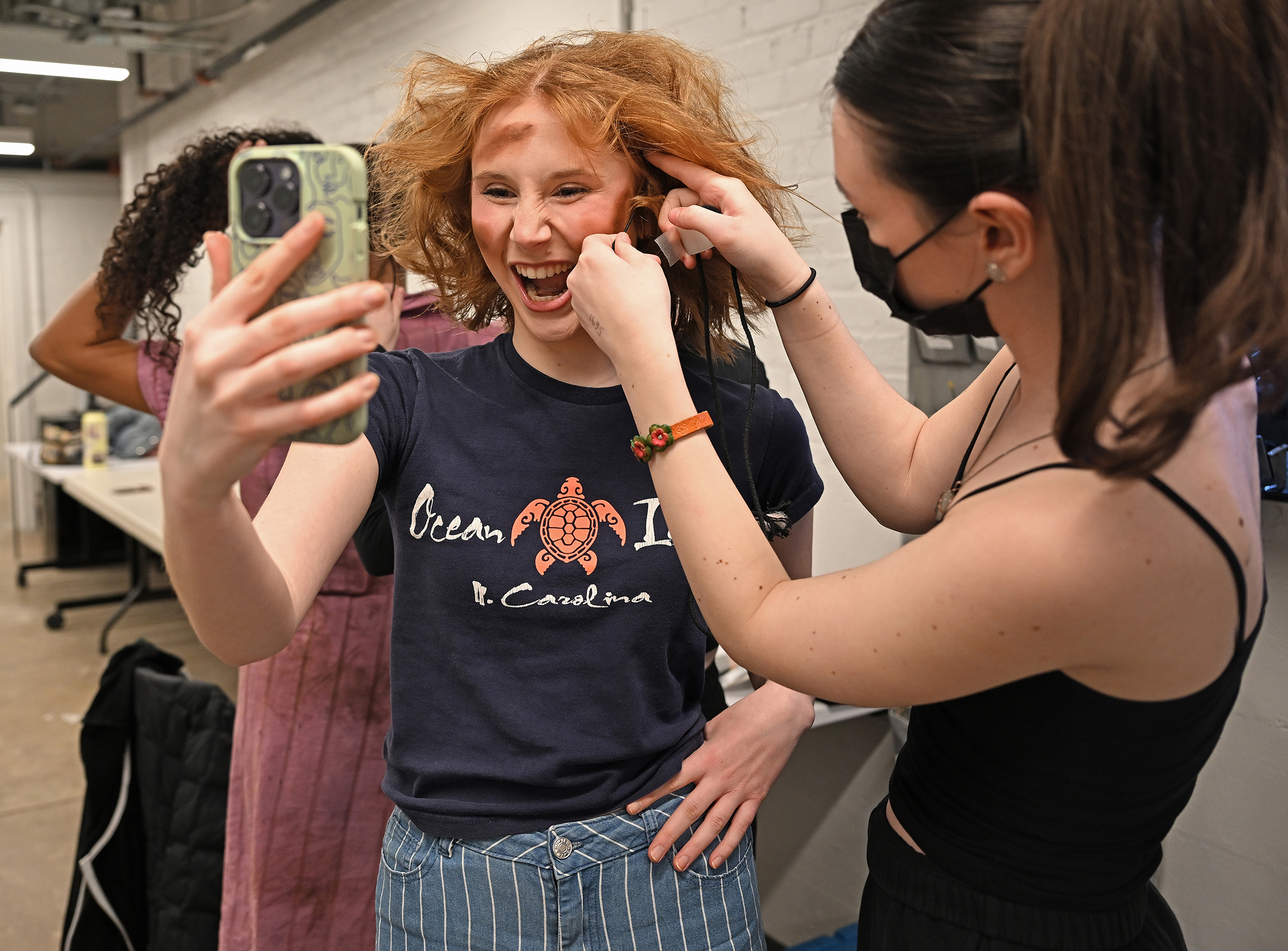 Actor laughs while showing crazy hairstyle to friend over video call