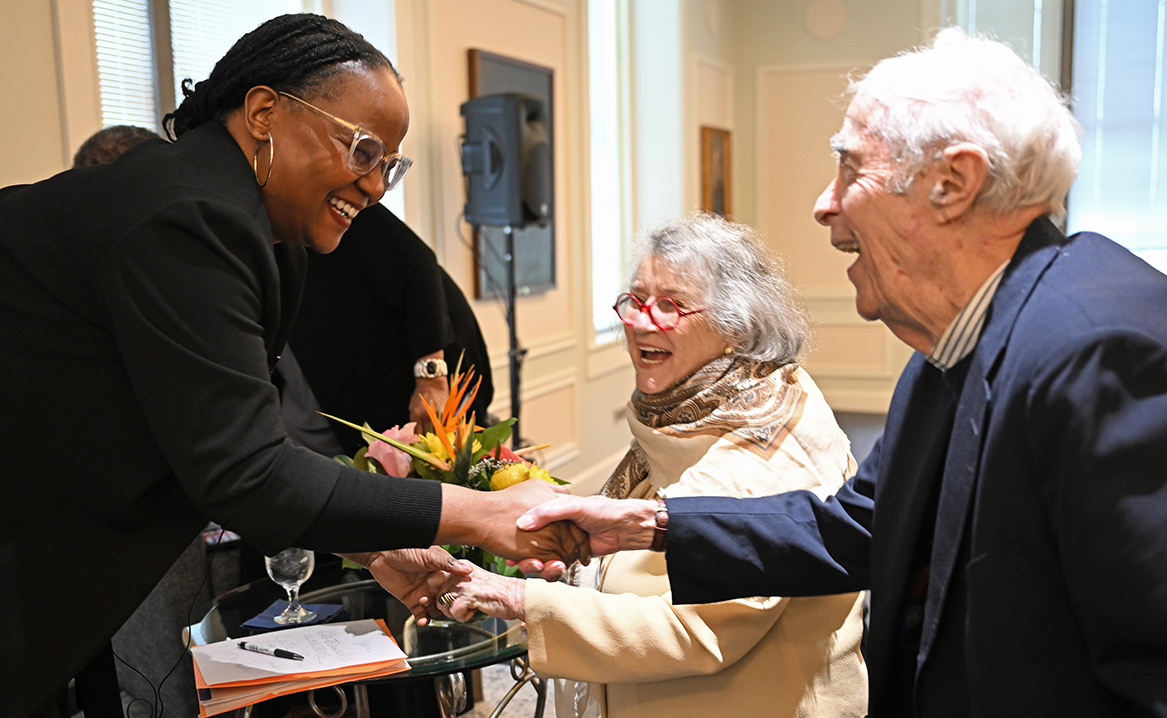 Author Edwidge Danticat greets Emilie and Herbert Klagsbrun P’86.